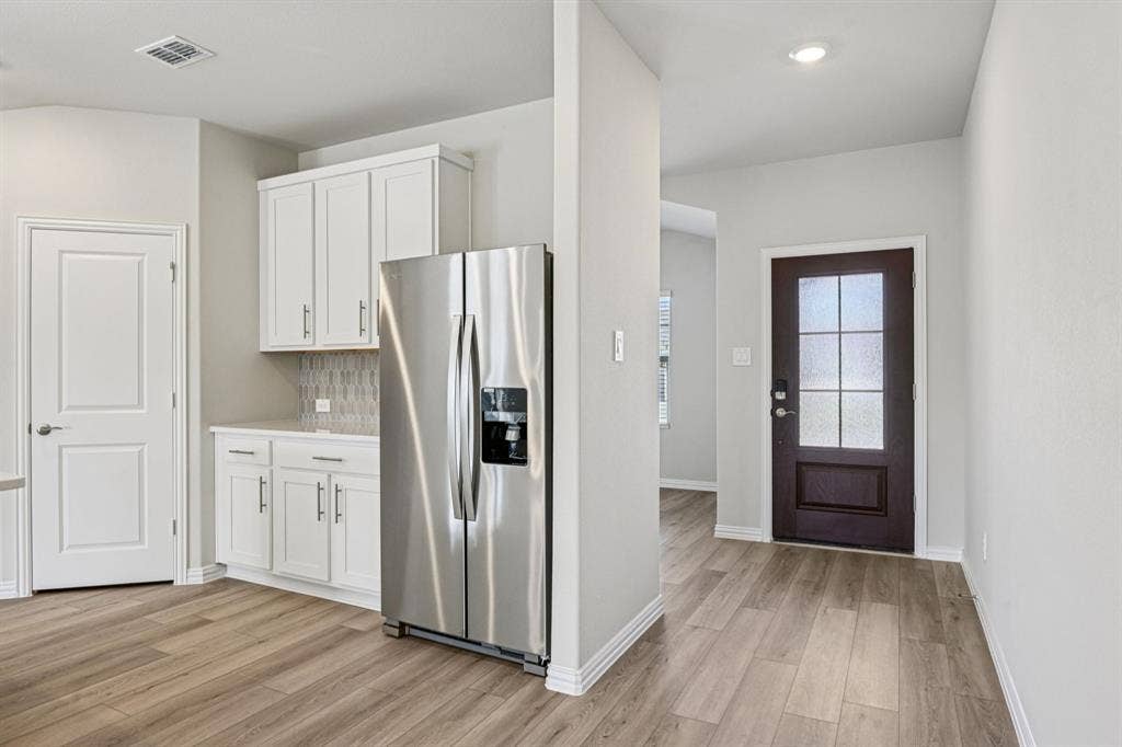 3057 Texoma Boulevard, Farmersville, TX 75442 Photo is not of the actual home, but is an inspirational photo of builder’s model home and may depict options, furnishings, and/or decorator features that are not included.
