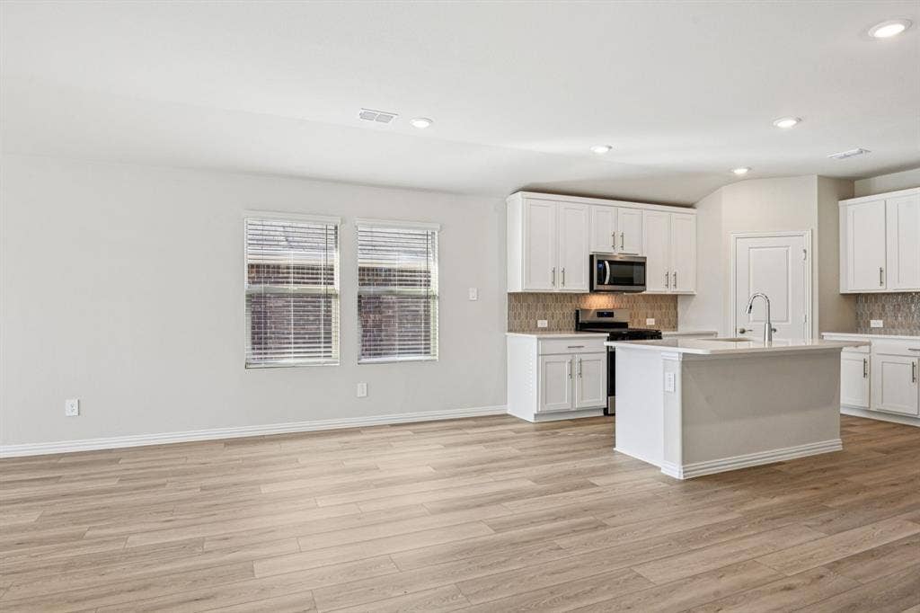 3057 Texoma Boulevard, Farmersville, TX 75442 Photo is not of the actual home, but is an inspirational photo of builder’s model home and may depict options, furnishings, and/or decorator features that are not included.
