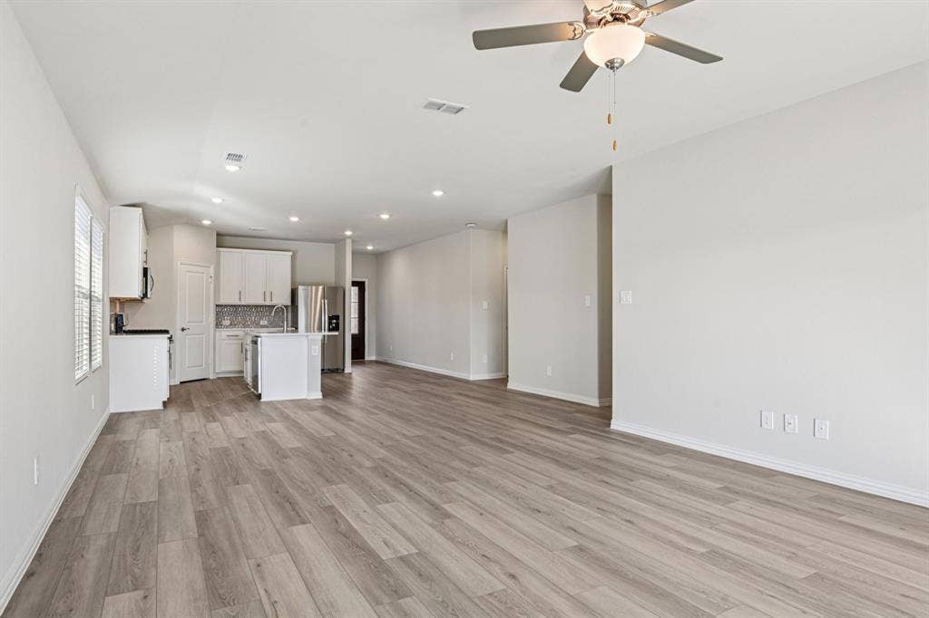3057 Texoma Boulevard, Farmersville, TX 75442 Photo is not of the actual home, but is an inspirational photo of builder’s model home and may depict options, furnishings, and/or decorator features that are not included.
