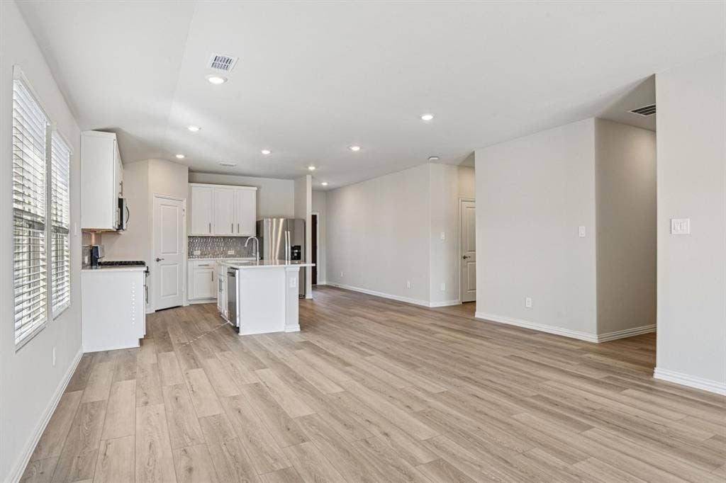 3057 Texoma Boulevard, Farmersville, TX 75442 Photo is not of the actual home, but is an inspirational photo of builder’s model home and may depict options, furnishings, and/or decorator features that are not included.