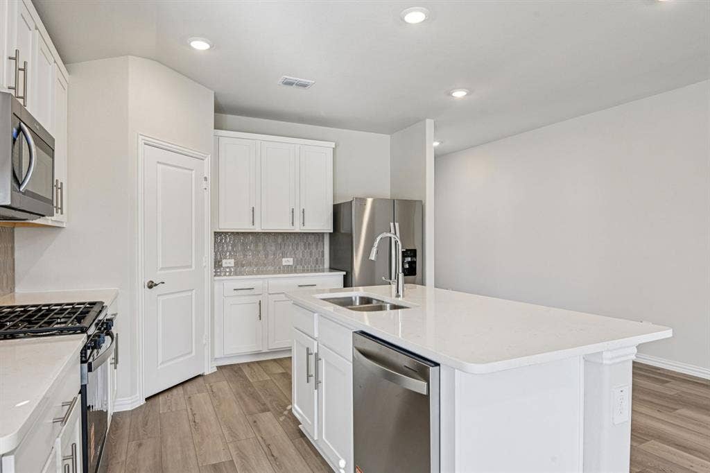 3057 Texoma Boulevard, Farmersville, TX 75442 Photo is not of the actual home, but is an inspirational photo of builder’s model home and may depict options, furnishings, and/or decorator features that are not included.