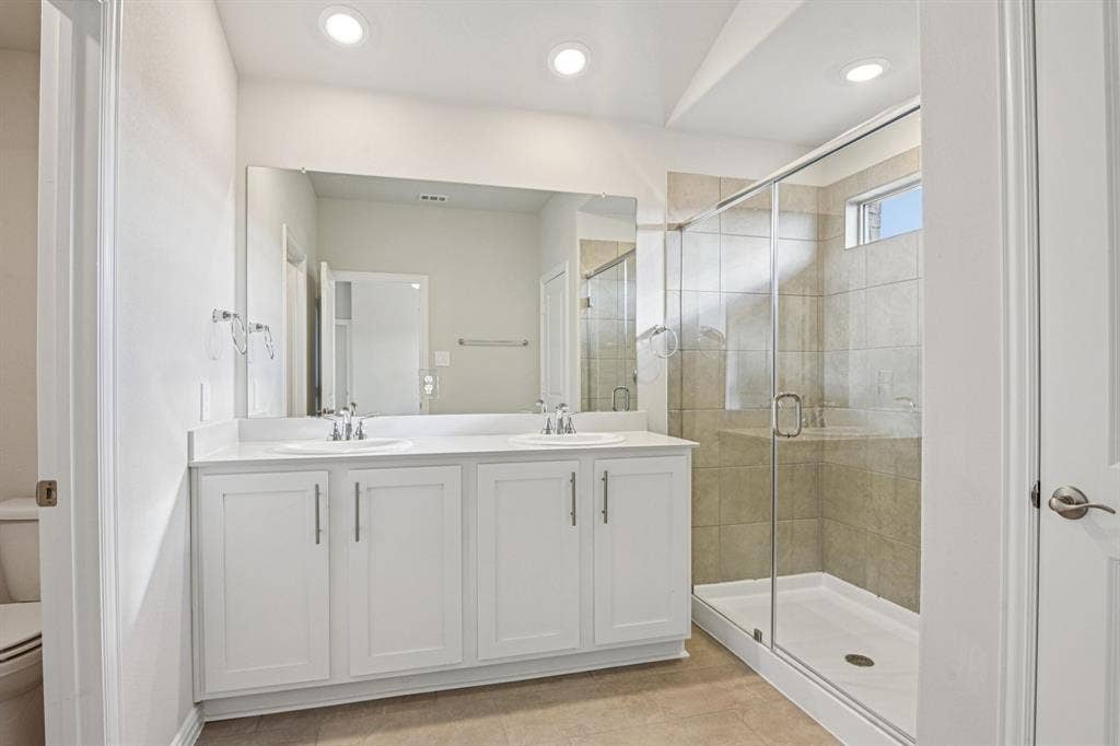 3057 Texoma Boulevard, Farmersville, TX 75442 Photo is not of the actual home, but is an inspirational photo of builder’s model home and may depict options, furnishings, and/or decorator features that are not included.