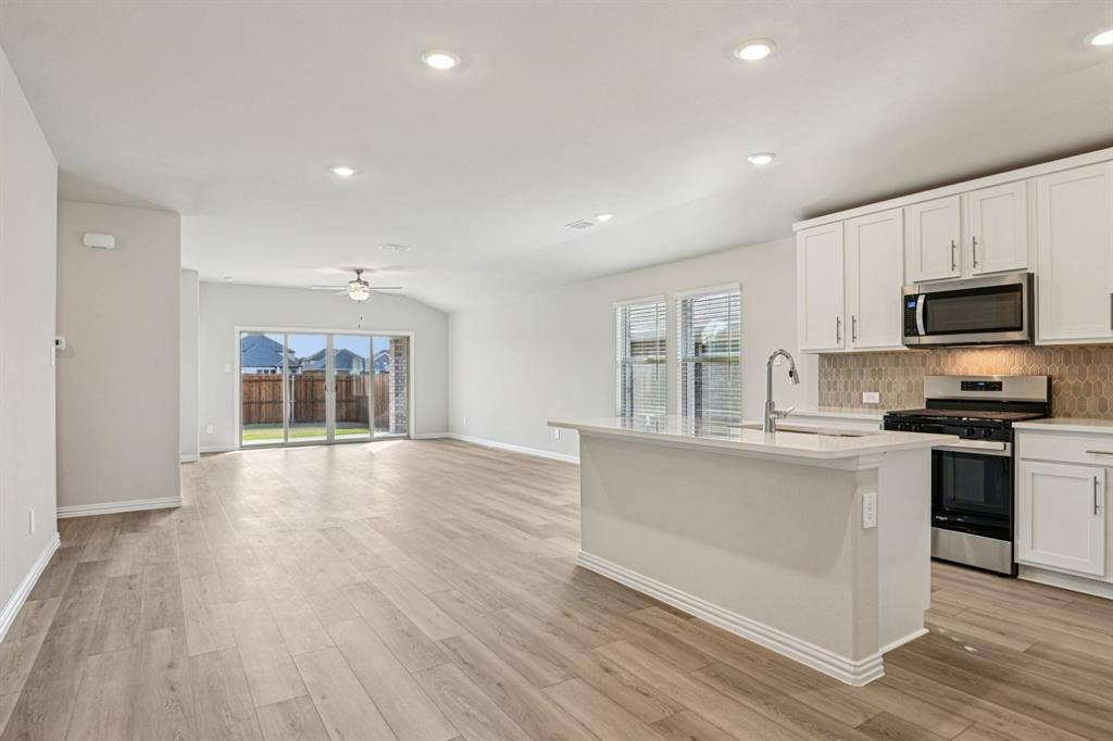 3057 Texoma Boulevard, Farmersville, TX 75442 Photo is not of the actual home, but is an inspirational photo of builder’s model home and may depict options, furnishings, and/or decorator features that are not included.