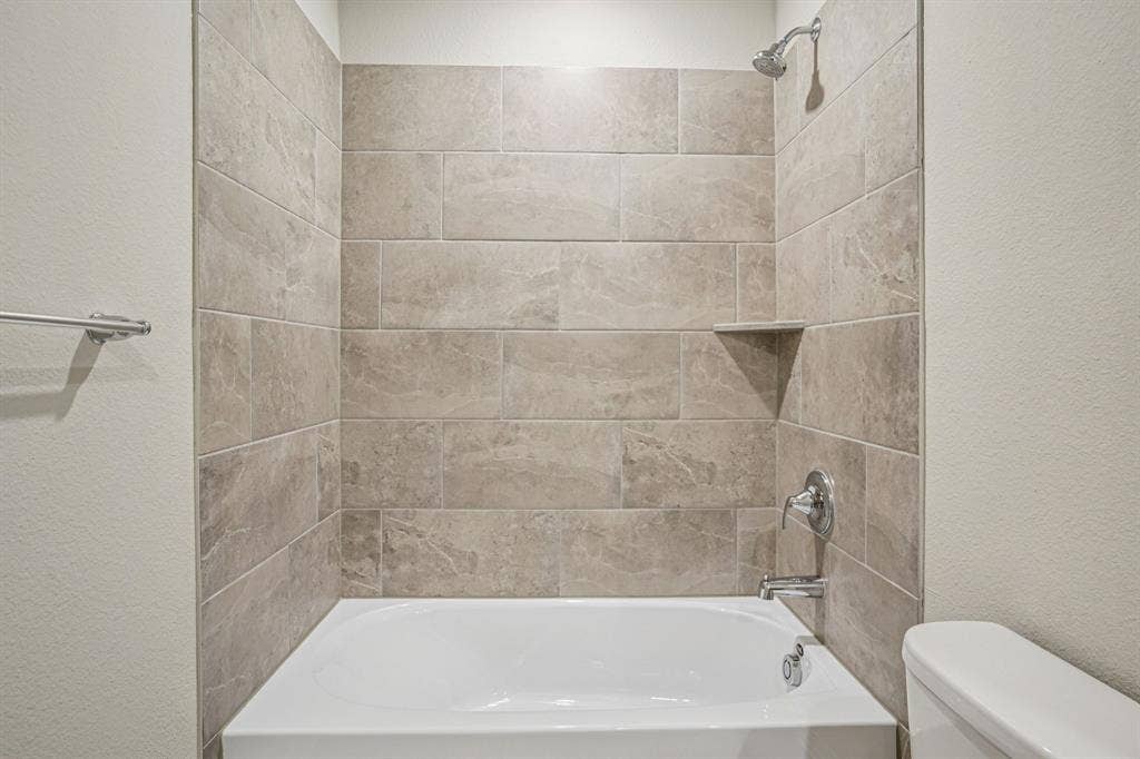 3053 Texoma Boulevard, Farmersville, TX 75442 Photo is not of the actual home, but is an inspirational photo of builder’s model home and may depict options, furnishings, and/or decorator features that are not included.