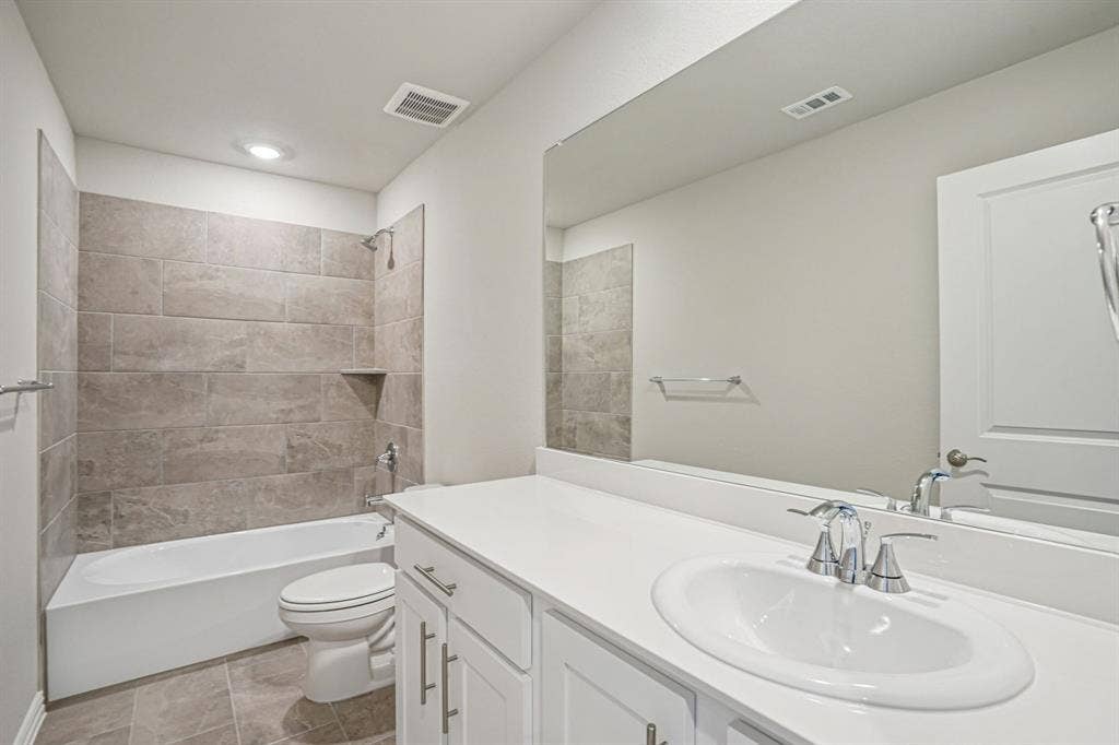 3053 Texoma Boulevard, Farmersville, TX 75442 Photo is not of the actual home, but is an inspirational photo of builder’s model home and may depict options, furnishings, and/or decorator features that are not included.