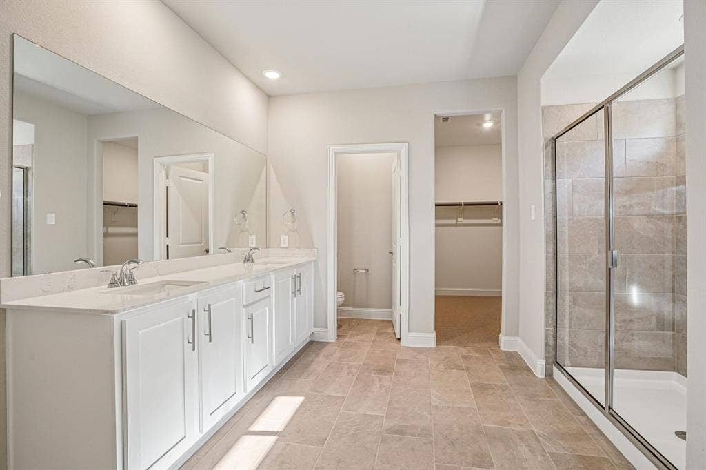 3053 Texoma Boulevard, Farmersville, TX 75442 Photo is not of the actual home, but is an inspirational photo of builder’s model home and may depict options, furnishings, and/or decorator features that are not included.