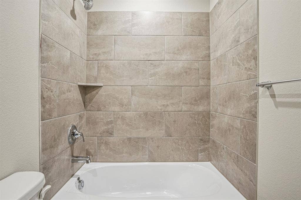 3053 Texoma Boulevard, Farmersville, TX 75442 Photo is not of the actual home, but is an inspirational photo of builder’s model home and may depict options, furnishings, and/or decorator features that are not included.