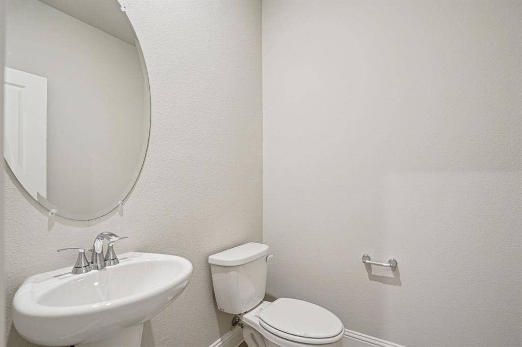 3053 Texoma Boulevard, Farmersville, TX 75442 Photo is not of the actual home, but is an inspirational photo of builder’s model home and may depict options, furnishings, and/or decorator features that are not included.