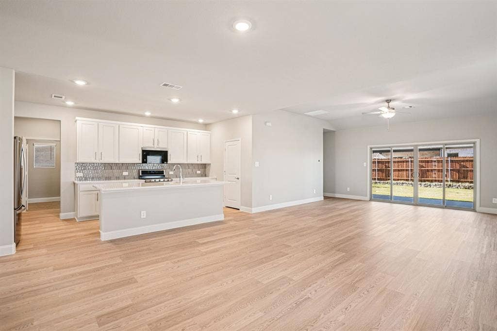 3053 Texoma Boulevard, Farmersville, TX 75442 Photo is not of the actual home, but is an inspirational photo of builder’s model home and may depict options, furnishings, and/or decorator features that are not included.