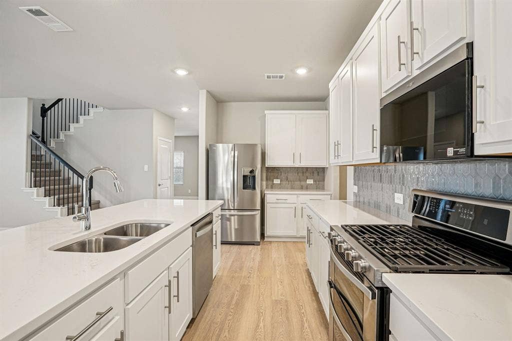 3053 Texoma Boulevard, Farmersville, TX 75442 Photo is not of the actual home, but is an inspirational photo of builder’s model home and may depict options, furnishings, and/or decorator features that are not included.