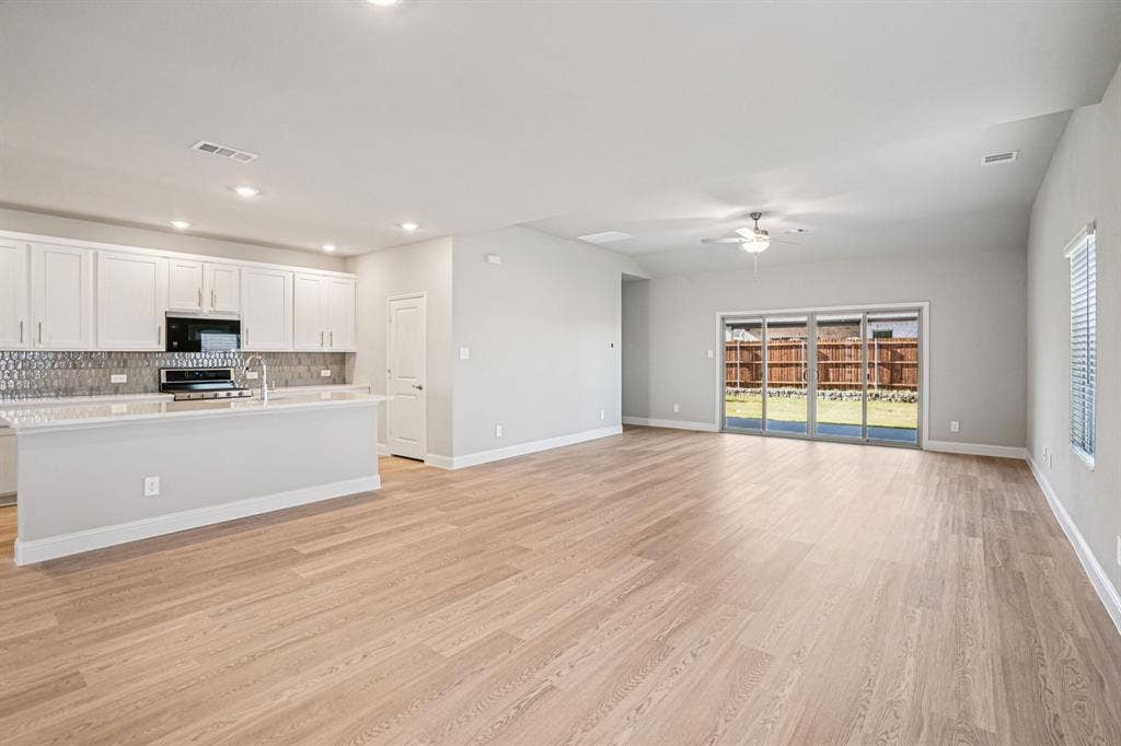 3053 Texoma Boulevard, Farmersville, TX 75442 Photo is not of the actual home, but is an inspirational photo of builder’s model home and may depict options, furnishings, and/or decorator features that are not included.