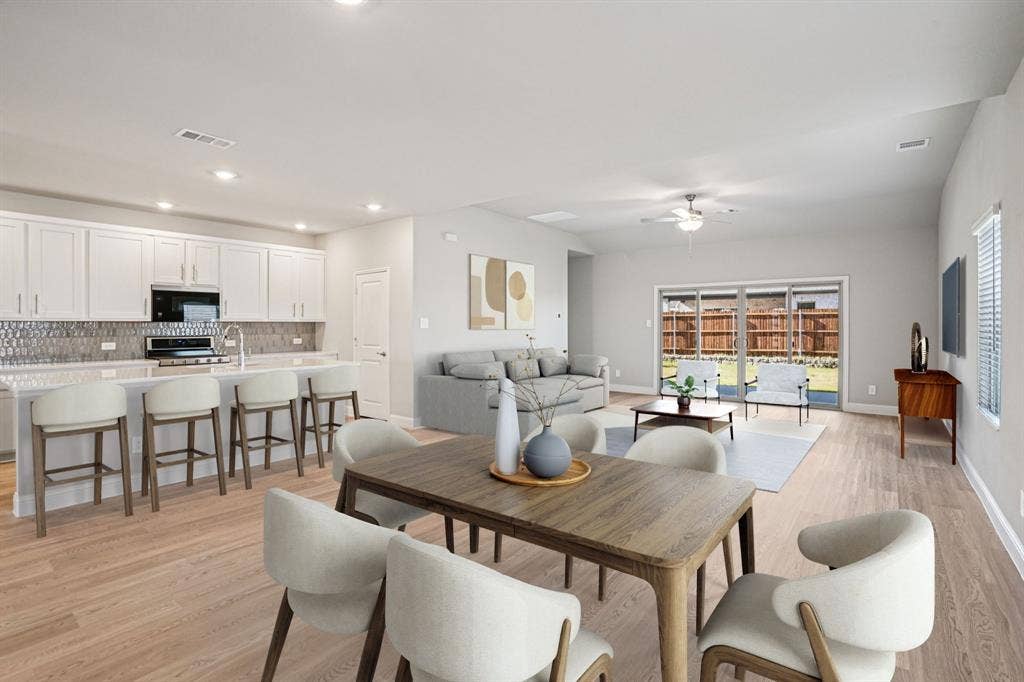 3053 Texoma Boulevard, Farmersville, TX 75442 Photo is not of the actual home, but is an inspirational photo of builder’s model home and may depict options, furnishings, and/or decorator features that are not included.