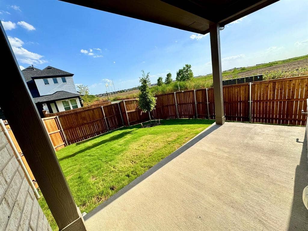 2930 Eleanor Drive, Prosper, TX 75078 Fenced backyard featuring a patio