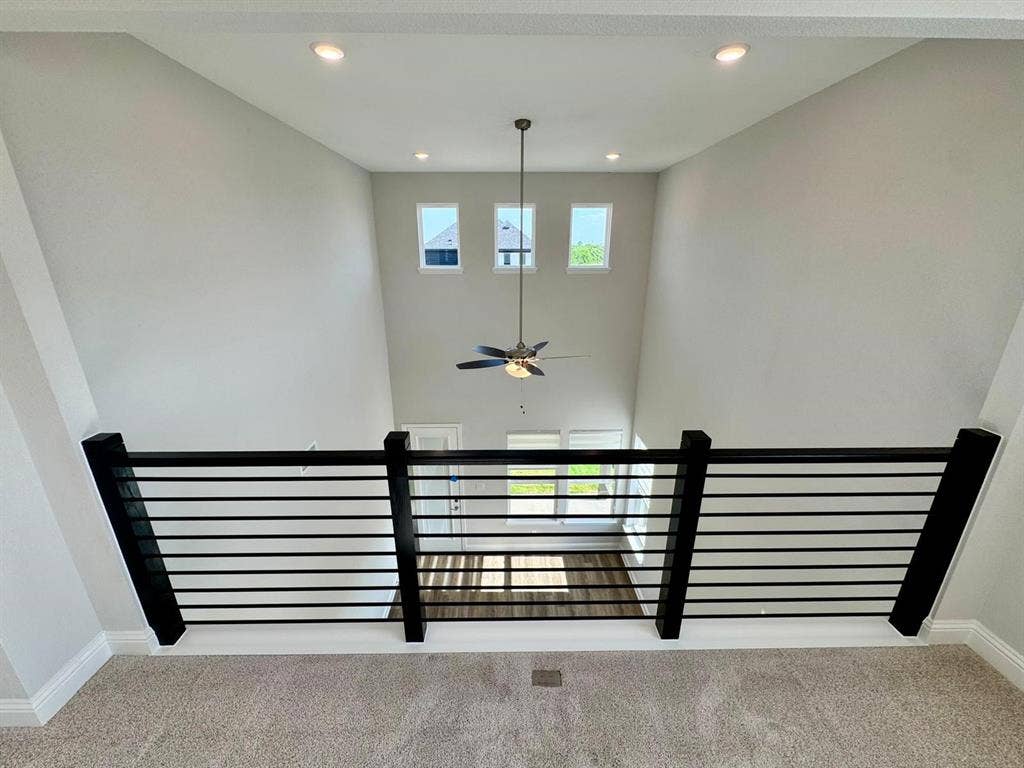 2930 Eleanor Drive, Prosper, TX 75078 Stairway featuring carpet floors, recessed lighting, a high ceiling, and ceiling fan