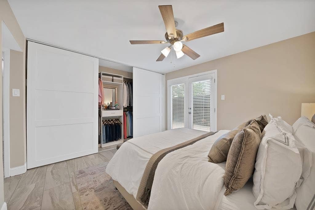 5904 Sandhurst Lane, #145, Dallas, TX 75206 Primary with doors to back deck