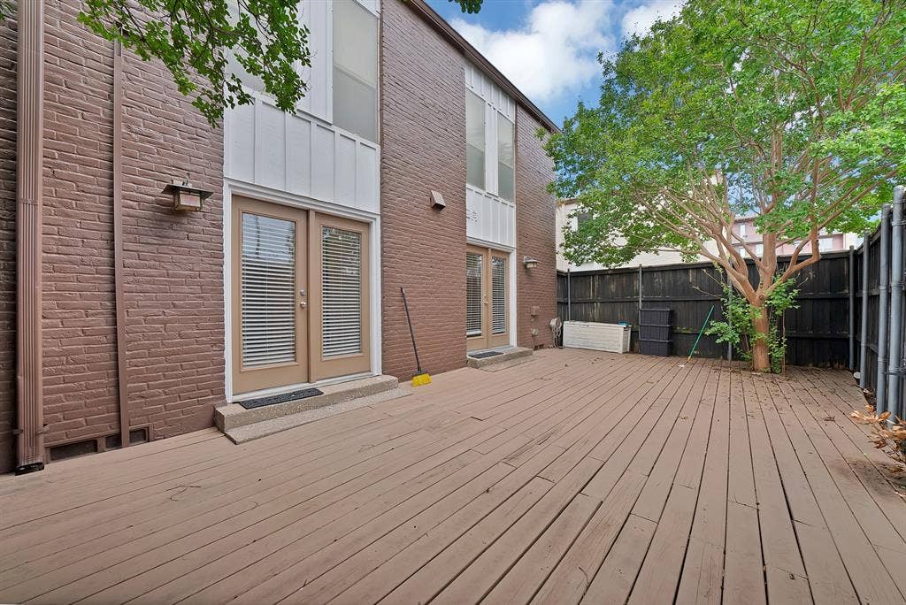 5904 Sandhurst Lane, #145, Dallas, TX 75206 Back area with doors off of bedrooms
