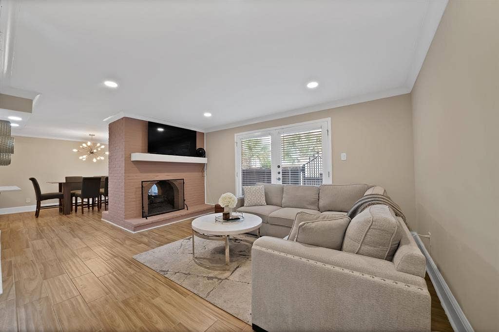 5904 Sandhurst Lane, #145, Dallas, TX 75206 See through fireplace and large living area