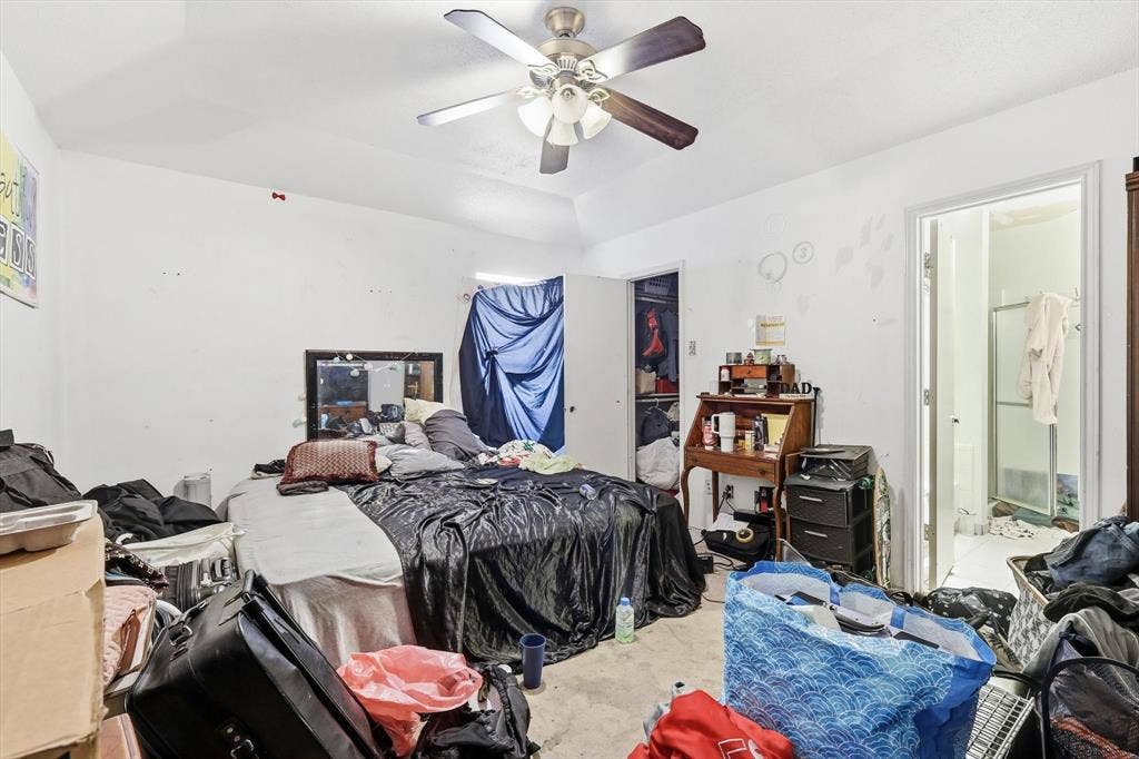 6406 Nicole Way, Arlington, TX 76002 Primary bedroom with ceiling fan and ensuite bathroom