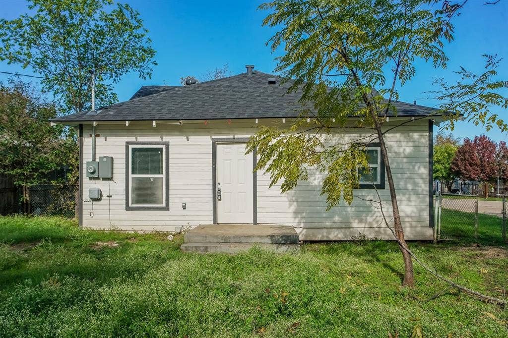 2402 Summer Avenue, Waco, TX 76708 White exterior siding with dark trim accents