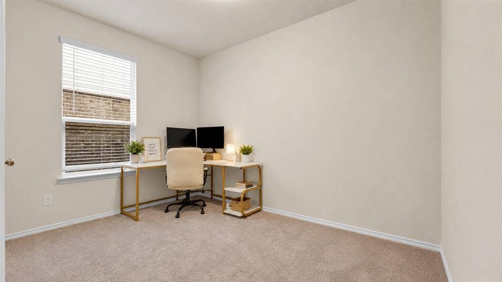 707 Indigo Road, Princeton, TX 75407 Carpeted room with closet, featuring light neutral wall paint, a single window with blinds, and white trim