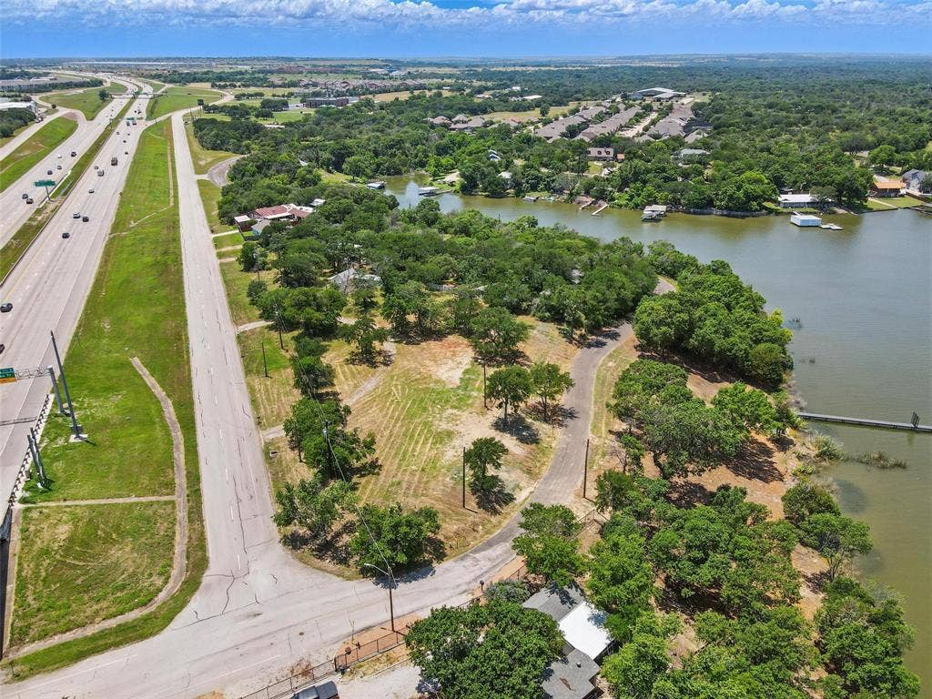 8505 Heron Drive, Fort Worth, TX 76108 View of property location with a major roadway and a large body of water