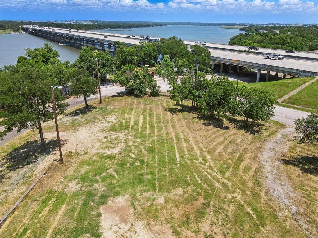 8505 Heron Drive, Fort Worth, TX 76108 Aerial view of a nearby body of water and a notable bridge