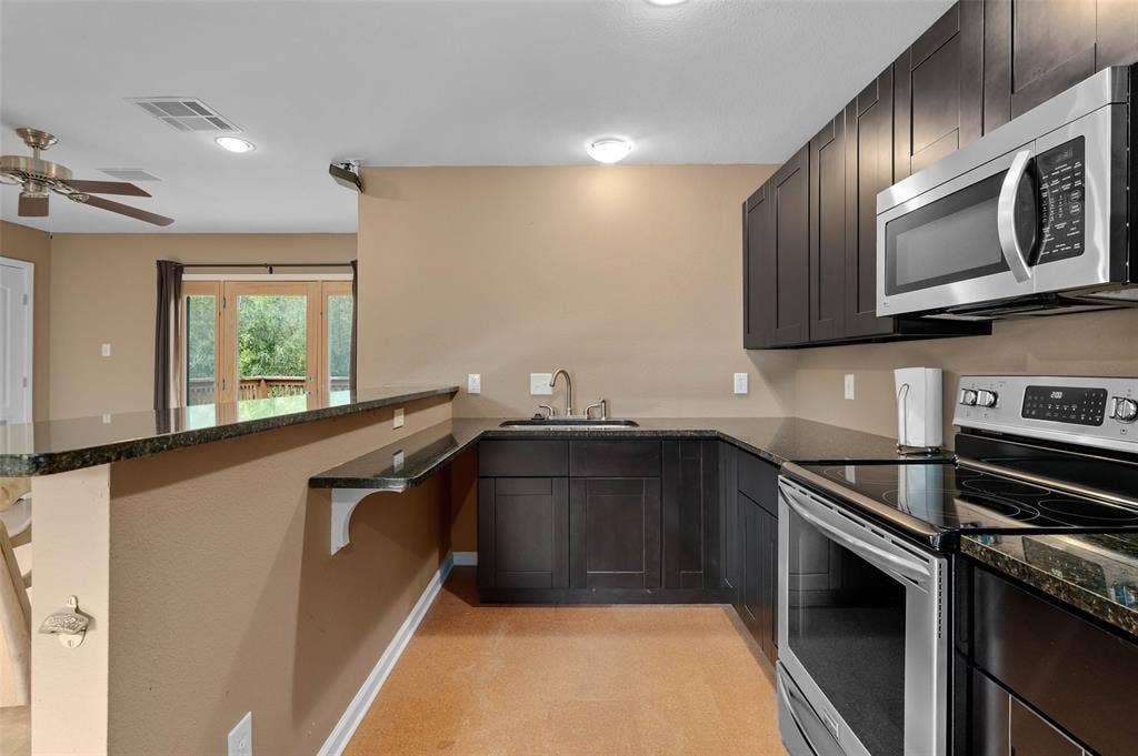 Income potential! Game room or ADU kitchen