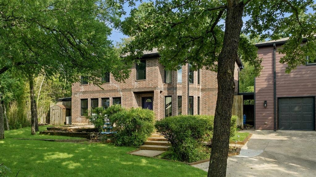 Welcome Home! This home features a separate garage with ADU or game room above.