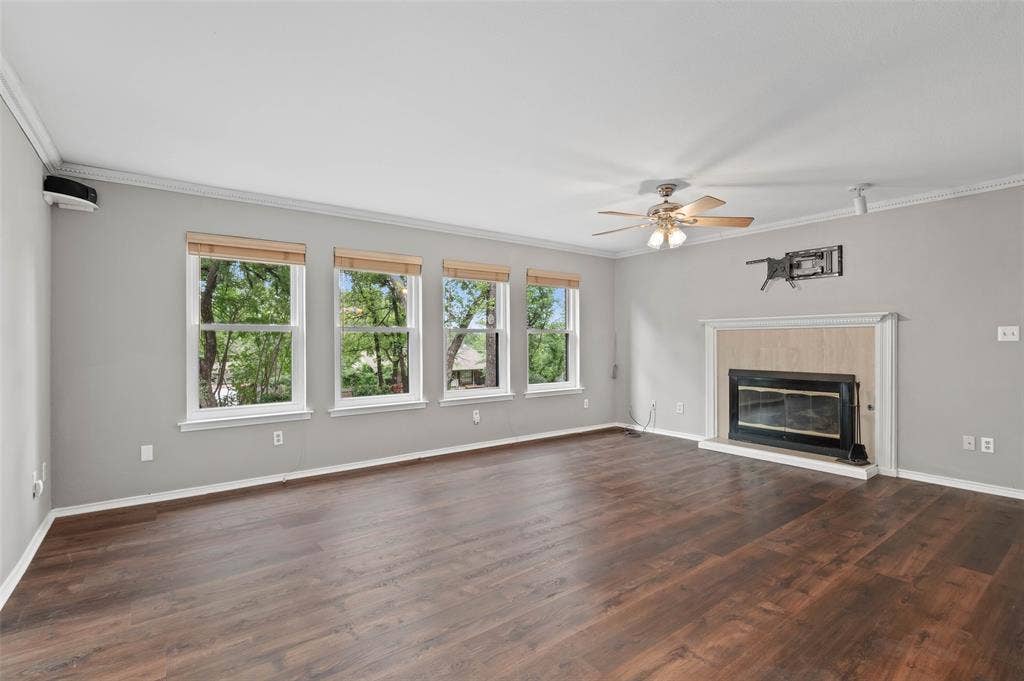 Living room with fireplace and new Pella windows