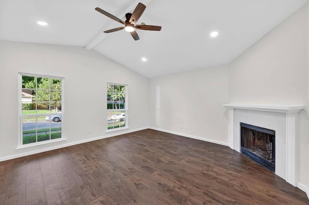 428 Dollins Street, Cedar Hill, TX 75104 Spacious room featuring vaulted ceilings, wood-finish flooring, and recessed lighting