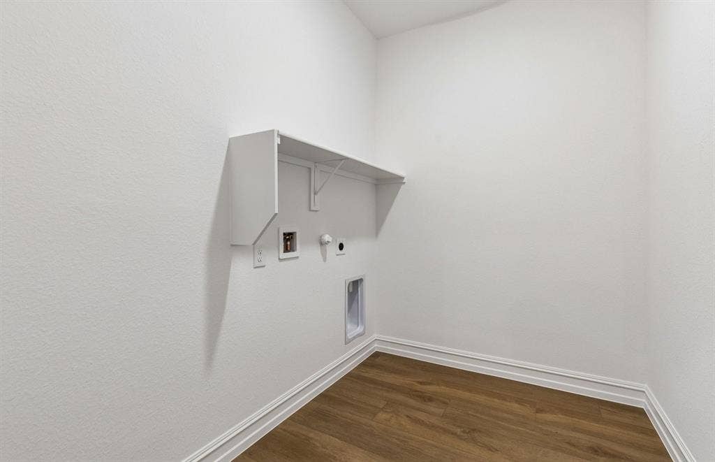 509 Apricot Court, Forney, TX 75126 Laundry room with built-in shelving