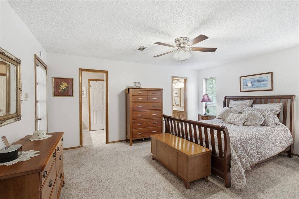 521 W Louella Drive, Hurst, TX 76054 Primary bedroom with two entrances into the bathroom- a his and hers side.