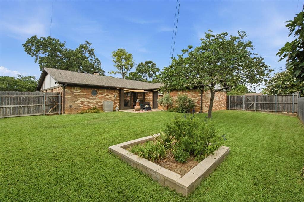 521 W Louella Drive, Hurst, TX 76054 A raised garden would be perfect to grow vegetables.