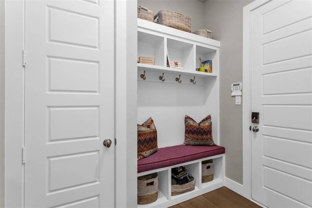 8138 Edgefield Court, Frisco, TX 75035 Built-in mudroom bench with storage cubbies and upper shelving