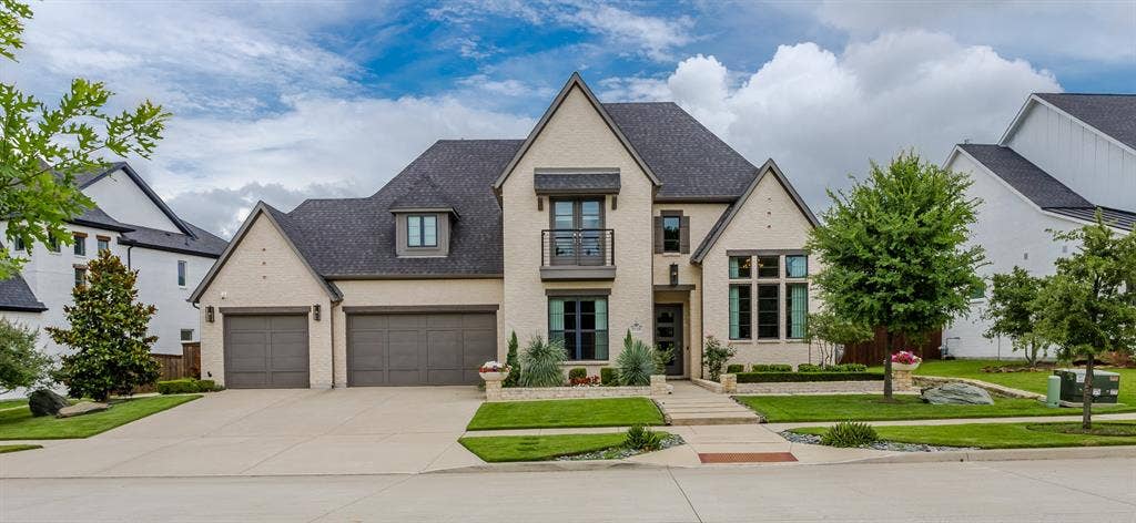 8138 Edgefield Court, Frisco, TX 75035 Modern traditional facade with light-colored brick exterior and dark shingle roof
