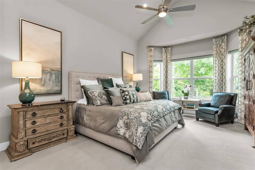 8138 Edgefield Court, Frisco, TX 75035 Spacious room featuring a vaulted ceiling and a ceiling fan with integrated lighting