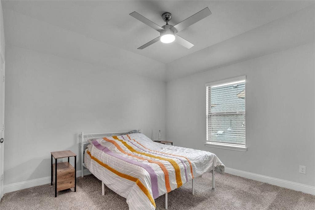 3708 Jan Camille Court, Celina, TX 75009 Carpeted bedroom featuring lofted ceiling and ceiling fan