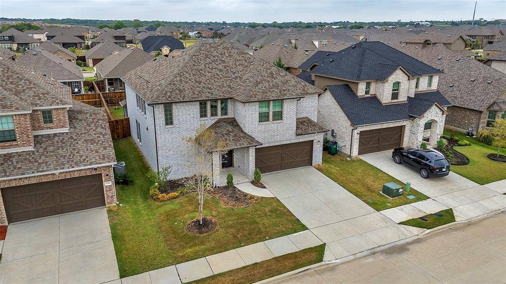 3708 Jan Camille Court, Celina, TX 75009 View of front of home with a garage and a front yard