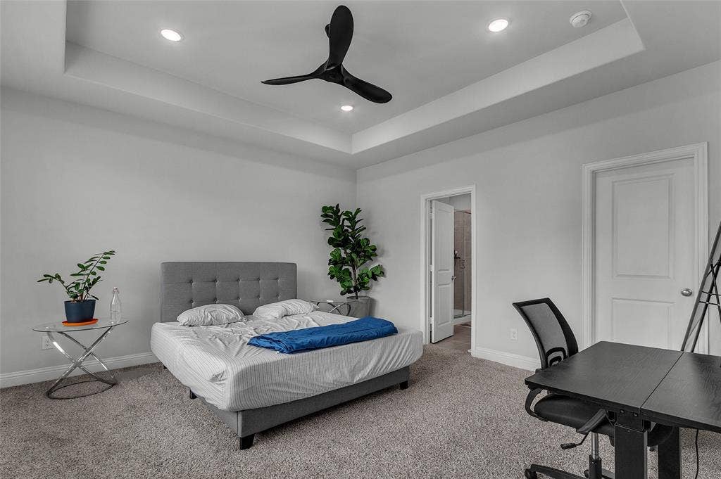 3708 Jan Camille Court, Celina, TX 75009 Bedroom featuring ceiling fan, carpet floors, and a tray ceiling