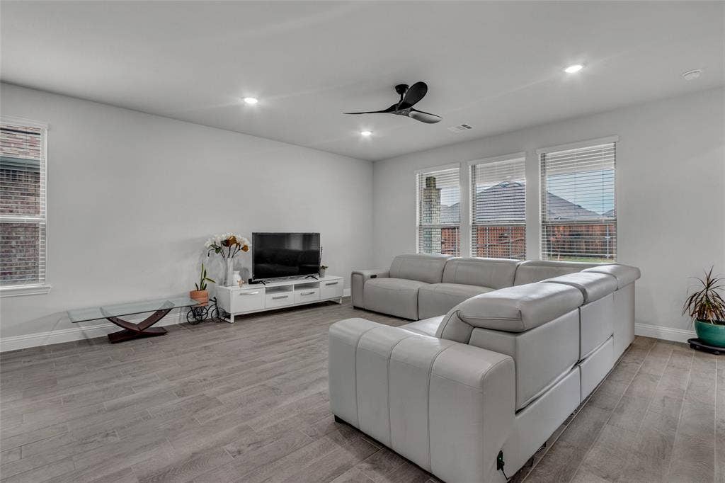 3708 Jan Camille Court, Celina, TX 75009 Living room featuring light wood-type flooring and ceiling fan