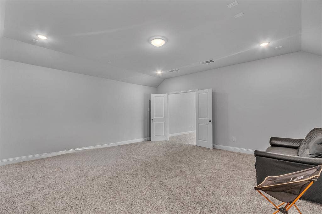 3708 Jan Camille Court, Celina, TX 75009 Sitting room featuring lofted ceiling and light colored carpet