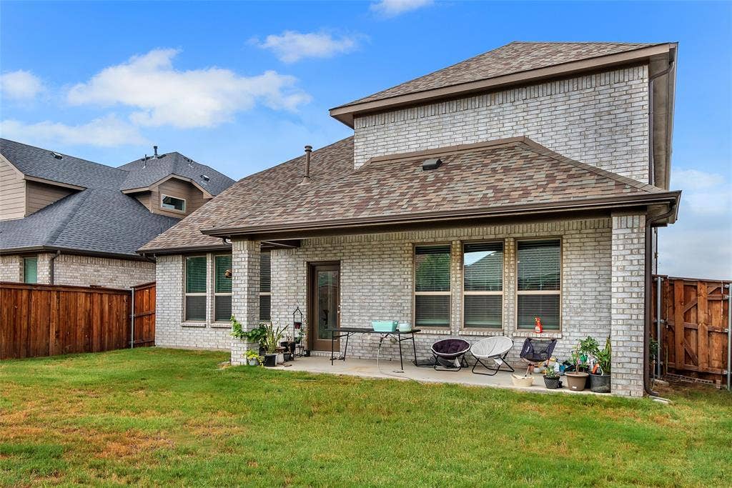3708 Jan Camille Court, Celina, TX 75009 Back of property with a yard and a patio