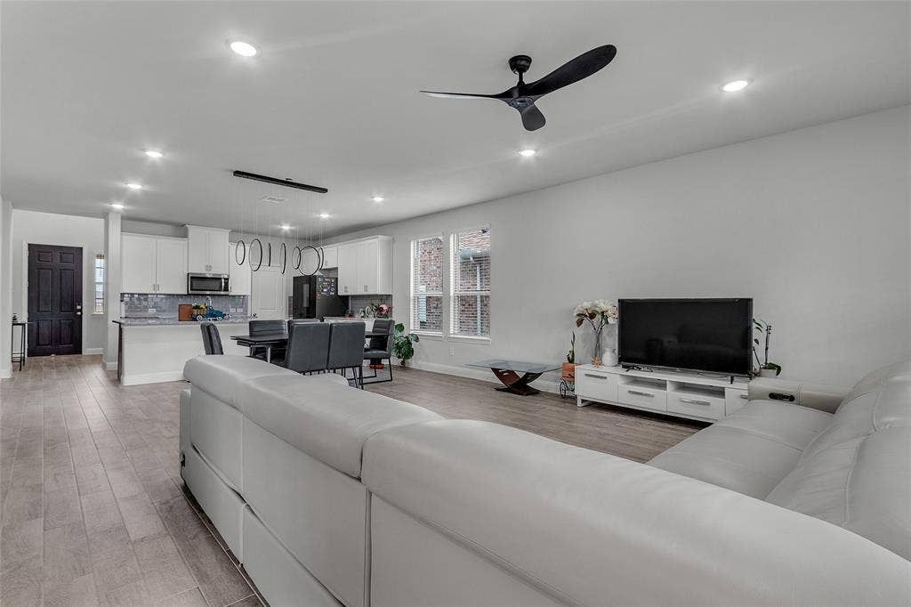3708 Jan Camille Court, Celina, TX 75009 Living room with ceiling fan and light hardwood / wood-style flooring