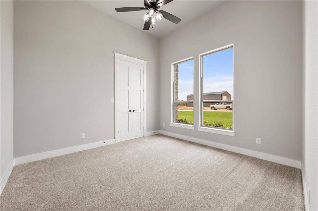 6610 Waggoner Way, Midlothian, TX 76065 Room with vaulted ceiling and light gray walls