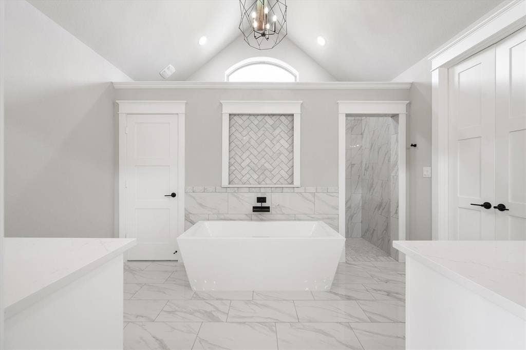 6610 Waggoner Way, Midlothian, TX 76065 Freestanding soaking tub with a wall-mounted matte black faucet