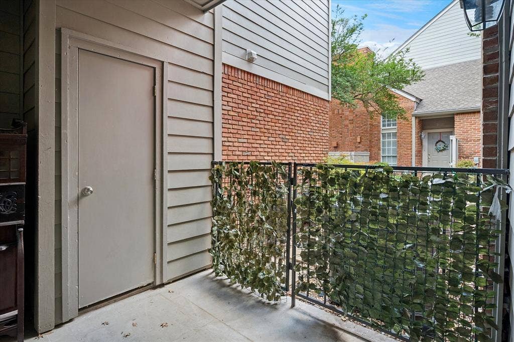 12680 Hillcrest Road, #1109, Dallas, TX 75230 Outdoor patio with a storage closet.
