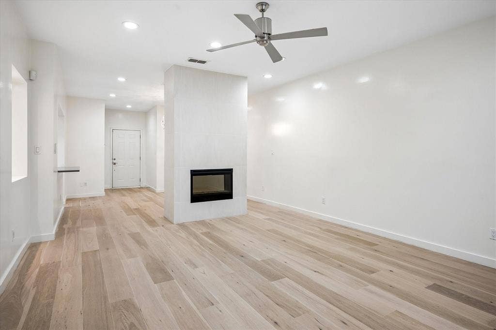 12680 Hillcrest Road, #1109, Dallas, TX 75230 Great flow and just the right amount of open concept. Fireplace makes a lovely focal point for the living room.