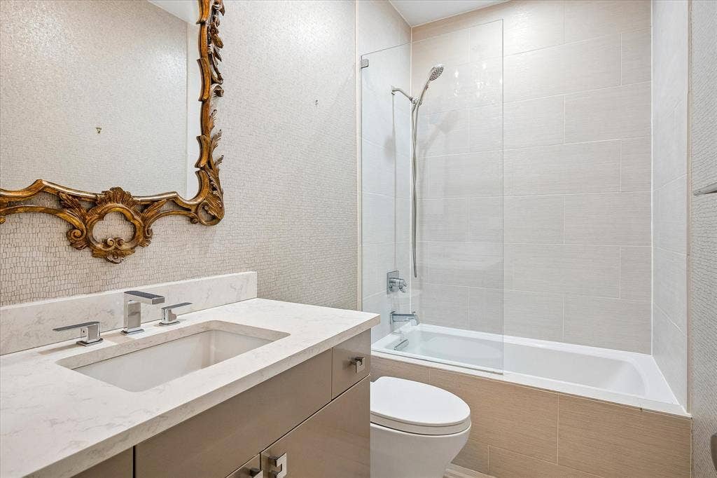 12680 Hillcrest Road, #1109, Dallas, TX 75230 Guest bathroom remodeled including acrylic cabinets.