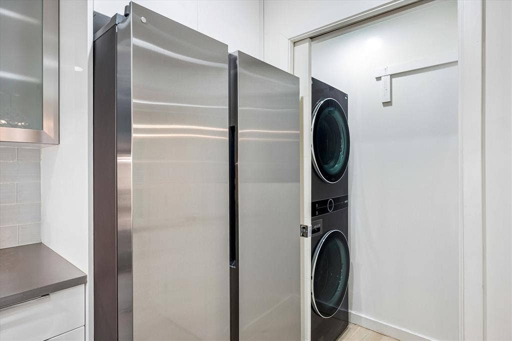 12680 Hillcrest Road, #1109, Dallas, TX 75230 Laundry room is off of the kitchen. LG stack washer dryer conveys.