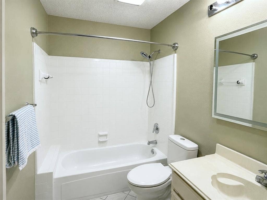 1221 Big Bend Drive, McKinney, TX 75069 Guest bathroom It’s ready for those active families, tiled tub, surround new toilet mirror with built in factory light, and new electrical, including GFCI. Just walk across the street to Wilson Creek Park and have a nice leisurely day while turning around it a kayak or canoe